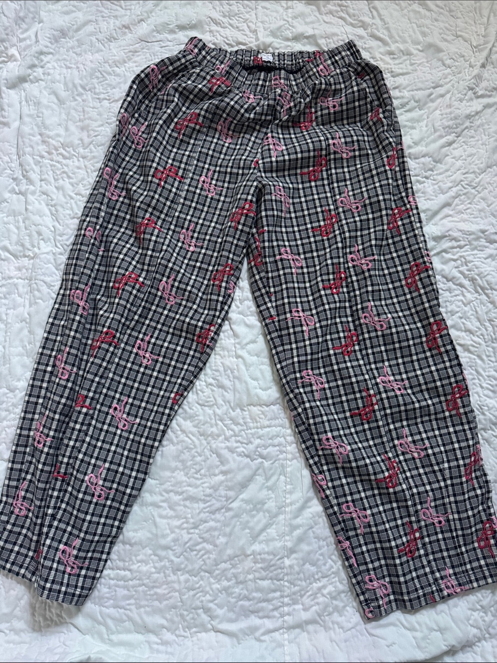 Kimchi Blue Black-and-White Plaid Wide-Leg Pants with Pink Ribbon Print